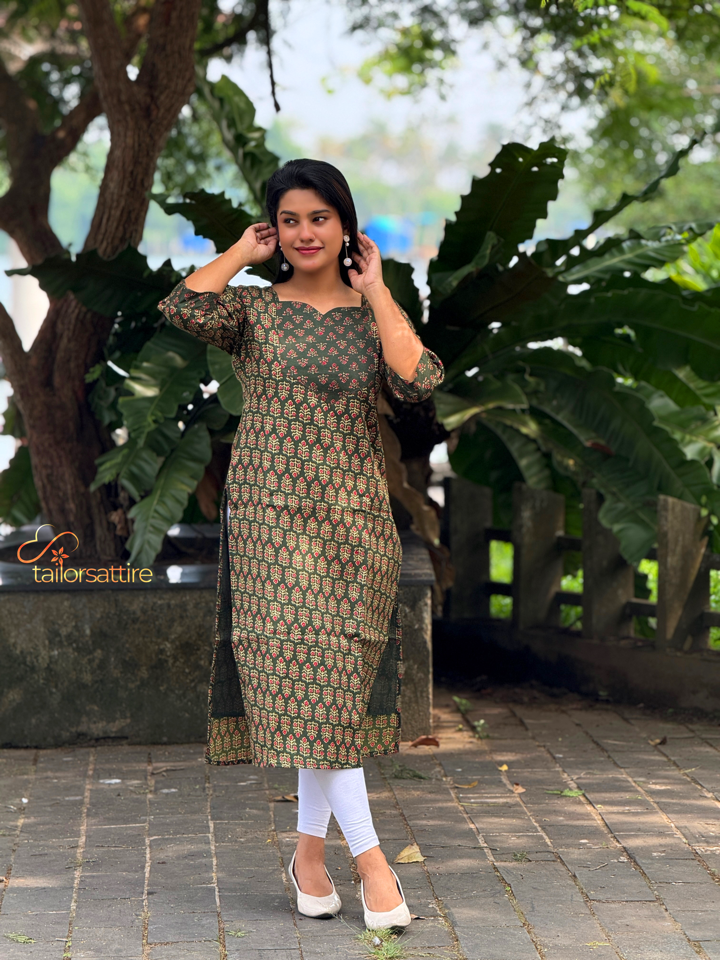 Green Polycotton Kurti With Elegant Red and Cream Patterns