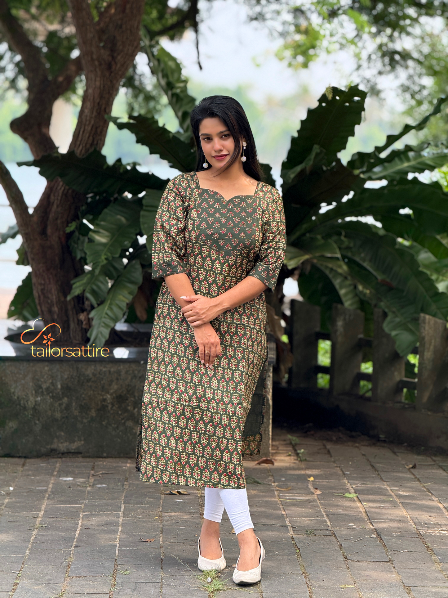 Green Polycotton Kurti With Elegant Red and Cream Patterns